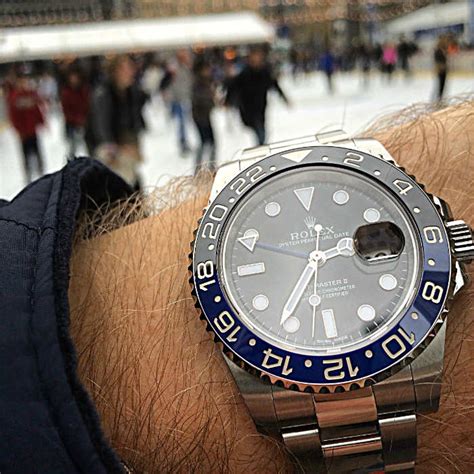 rolex gmt batman on wrist.